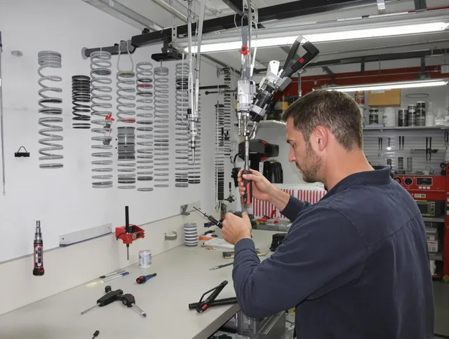 Brighton Garage Door Repair safety certified technician performing precision spring replacement in Brighton
