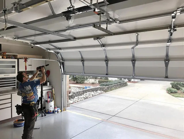 Garage door track repair service by Brighton Garage Door Repair in Brighton